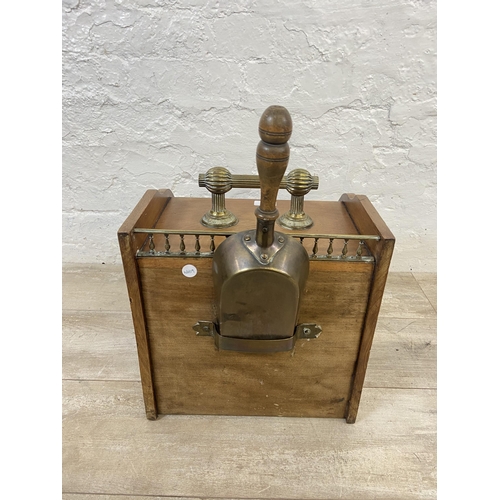 144 - A Victorian carved mahogany and brass coal scuttle with shovel - approx. 38cm high x 34cm wide x 45c... 