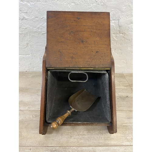 144 - A Victorian carved mahogany and brass coal scuttle with shovel - approx. 38cm high x 34cm wide x 45c... 