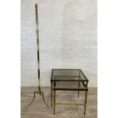 145 - Two items, one Hollywood Regency brass and smoked glass nest of two tables - approx. 46cm high x 56c... 