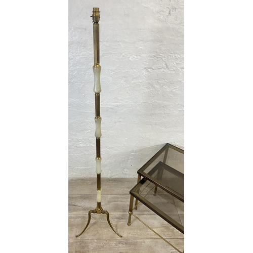 145 - Two items, one Hollywood Regency brass and smoked glass nest of two tables - approx. 46cm high x 56c... 