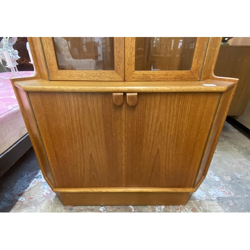 147 - A mid 20th century Turnidge of London teak free standing corner display cabinet - approx. 170cm high... 