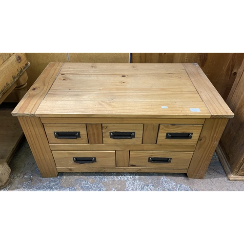 157 - A Mexican pine rectangular five drawer coffee table - approx. 46cm high x 50cm wide x 90cm deep