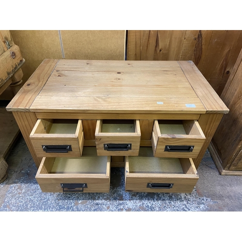 157 - A Mexican pine rectangular five drawer coffee table - approx. 46cm high x 50cm wide x 90cm deep