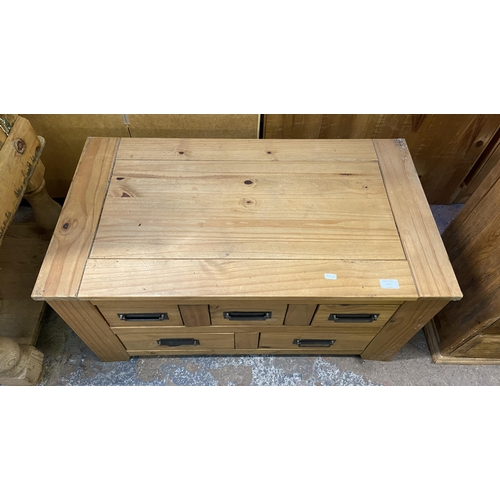 157 - A Mexican pine rectangular five drawer coffee table - approx. 46cm high x 50cm wide x 90cm deep