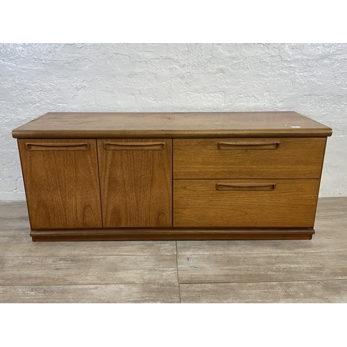 16 - A mid 20th century Meredew teak low sideboard - approx. 56cm high x 135cm wide x 45cm deep