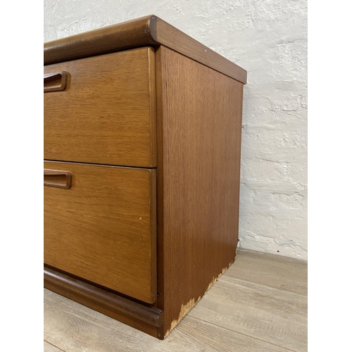 16 - A mid 20th century Meredew teak low sideboard - approx. 56cm high x 135cm wide x 45cm deep