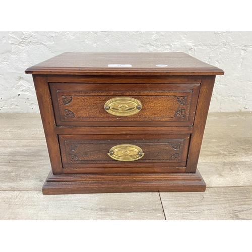 17 - A late 19th/early 20th century mahogany miniature chest of drawers - approx. 24cm high x 32cm wide x... 