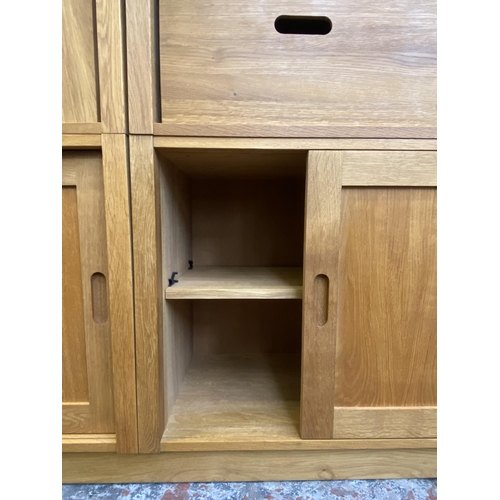 27 - A Laura Ashley Milton oak compartmental storage system - approx. 129cm high x 221cm wide x 40cm deep