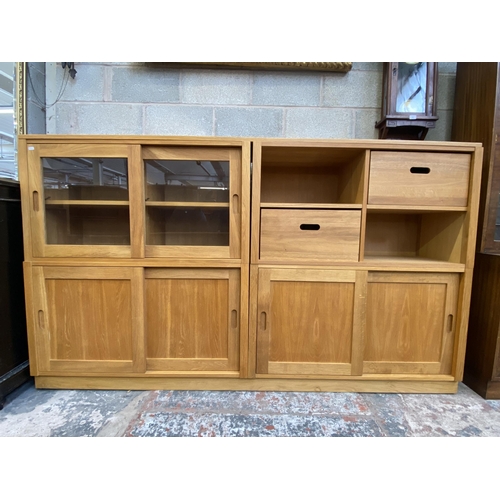 27 - A Laura Ashley Milton oak compartmental storage system - approx. 129cm high x 221cm wide x 40cm deep