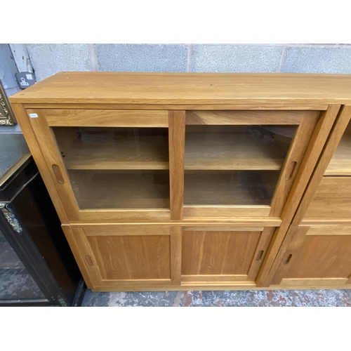 27 - A Laura Ashley Milton oak compartmental storage system - approx. 129cm high x 221cm wide x 40cm deep