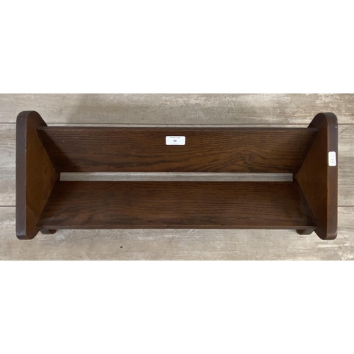 28 - An early 20th century oak book trough - approx. 14cm high x 61cm wide x 24cm deep