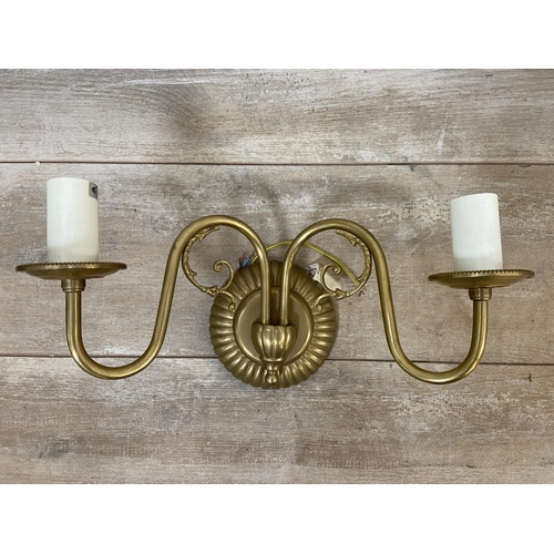 29 - Three pieces of modern lighting, two Laura Ashley brass twin branch wall lights and one aluminium fi... 