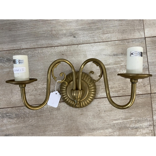 29 - Three pieces of modern lighting, two Laura Ashley brass twin branch wall lights and one aluminium fi... 