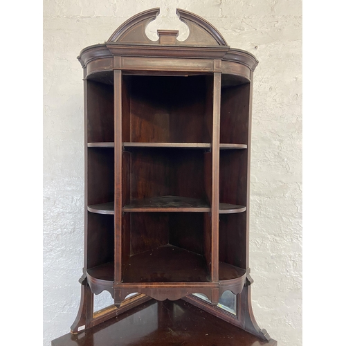 32 - An Edwardian Sheraton Revival marquetry inlaid mahogany corner display cabinet - approx. 200cm high ... 