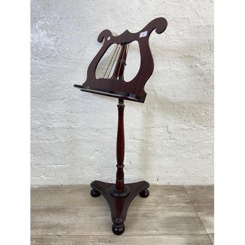 34 - A 19th century style mahogany music stand - approx. 96cm high x 46cm wide