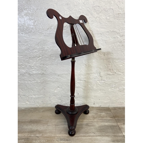 34 - A 19th century style mahogany music stand - approx. 96cm high x 46cm wide