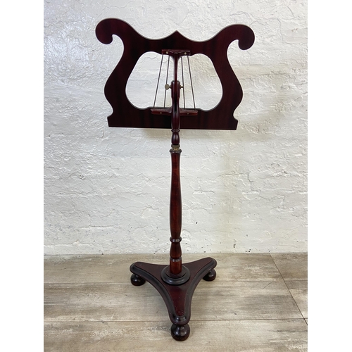 34 - A 19th century style mahogany music stand - approx. 96cm high x 46cm wide