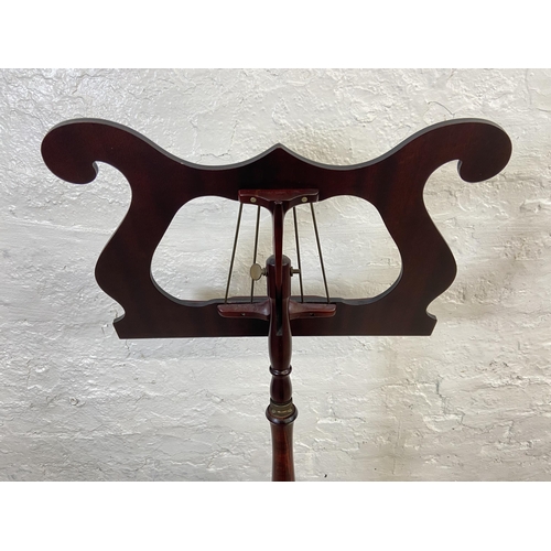 34 - A 19th century style mahogany music stand - approx. 96cm high x 46cm wide