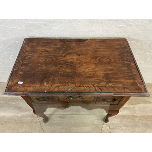 35 - An 18th century inlaid mahogany three drawer lowboy - approx. 72cm high x 79cm wide x 48cm deep