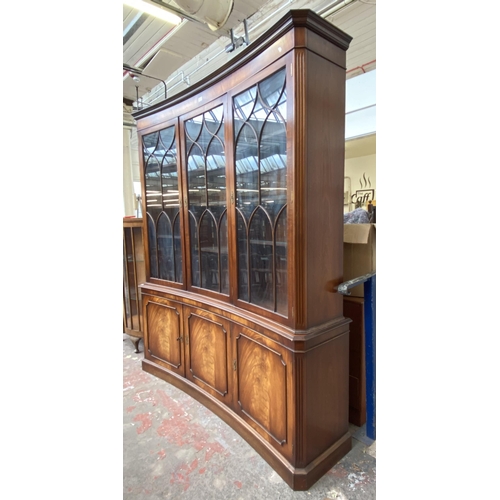 41 - A Bevan Funnell Ltd Reprodux mahogany glazed concave bookcase/display cabinet - approx. 205cm high x... 