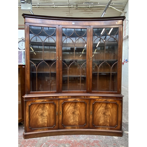 41 - A Bevan Funnell Ltd Reprodux mahogany glazed concave bookcase/display cabinet - approx. 205cm high x... 