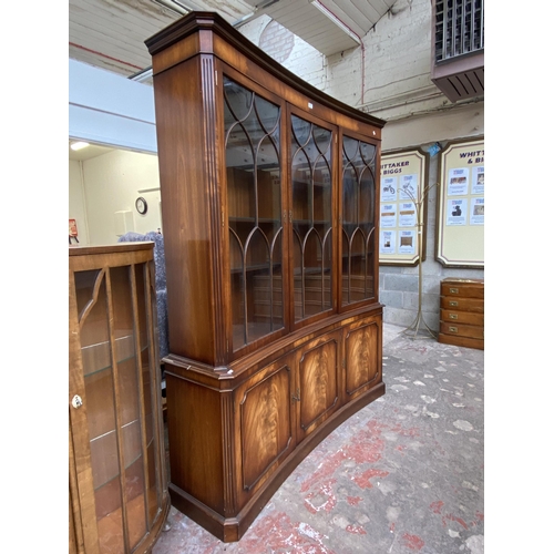 41 - A Bevan Funnell Ltd Reprodux mahogany glazed concave bookcase/display cabinet - approx. 205cm high x... 