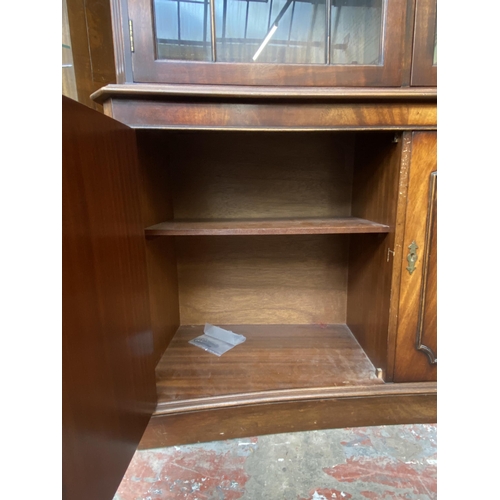 41 - A Bevan Funnell Ltd Reprodux mahogany glazed concave bookcase/display cabinet - approx. 205cm high x... 