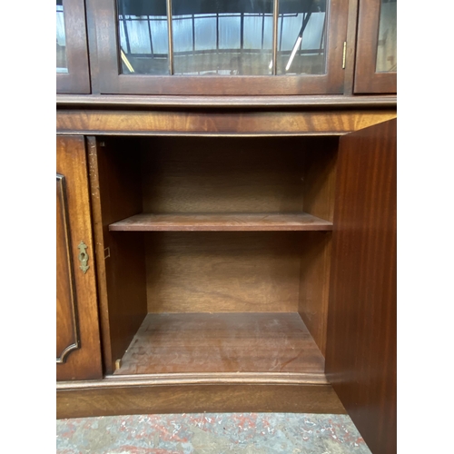 41 - A Bevan Funnell Ltd Reprodux mahogany glazed concave bookcase/display cabinet - approx. 205cm high x... 