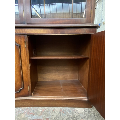 41 - A Bevan Funnell Ltd Reprodux mahogany glazed concave bookcase/display cabinet - approx. 205cm high x... 