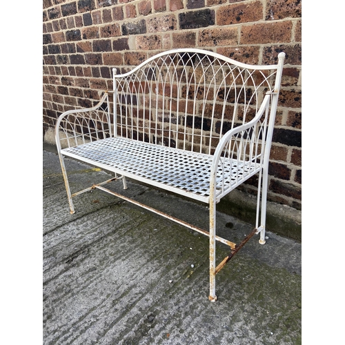 57 - A white painted wrought metal garden bench - approx. 96cm high x 114cm wide x 43cm deep