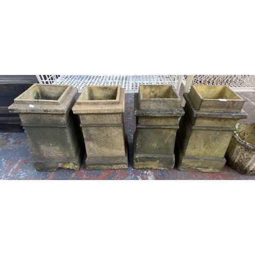 66 - Four 19th century clay chimney pots - approx. 58cm high