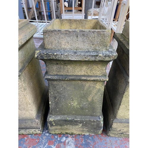 66 - Four 19th century clay chimney pots - approx. 58cm high