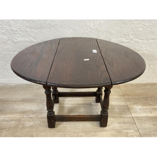 68 - Two oak side tables, one Jaycee drop leaf swivel top and one early 20th century rectangular barley t... 