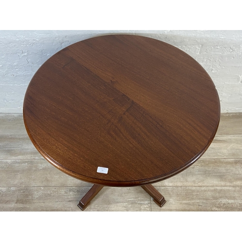 72 - A mid 20th century Danish afromosia circular occasional table - approx. 76cm high x 86cm diameter