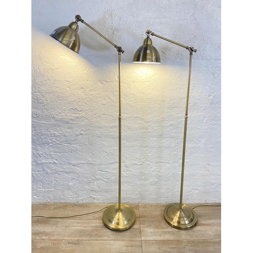 72B - A pair of Dunelm brushed brass effect floor lamps - approx. 152cm high