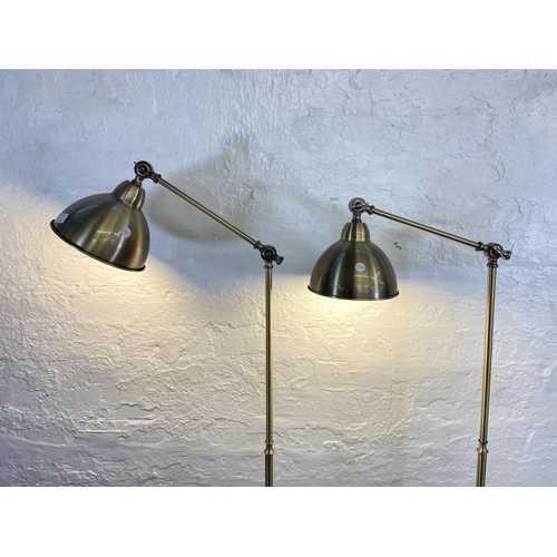 72B - A pair of Dunelm brushed brass effect floor lamps - approx. 152cm high