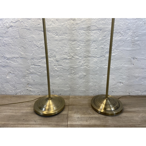 72B - A pair of Dunelm brushed brass effect floor lamps - approx. 152cm high