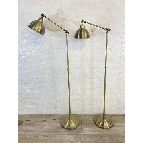 72B - A pair of Dunelm brushed brass effect floor lamps - approx. 152cm high