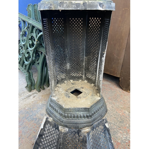 74 - A Victorian style black painted cast metal outdoor stove - approx. 170cm high