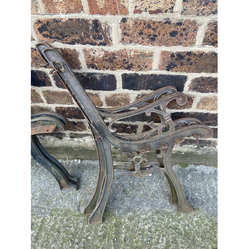 78 - Four cast iron garden bench ends