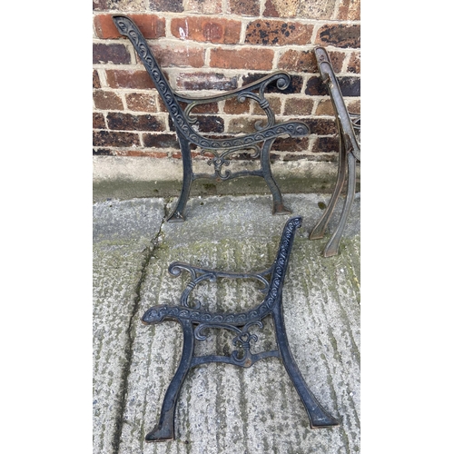 78 - Four cast iron garden bench ends