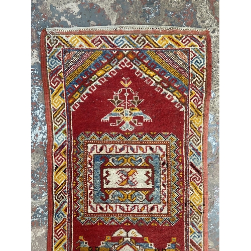 8 - A 20th century Turkish hand knotted hall runner - approx. 305cm x 76cm