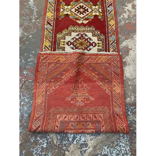 8 - A 20th century Turkish hand knotted hall runner - approx. 305cm x 76cm