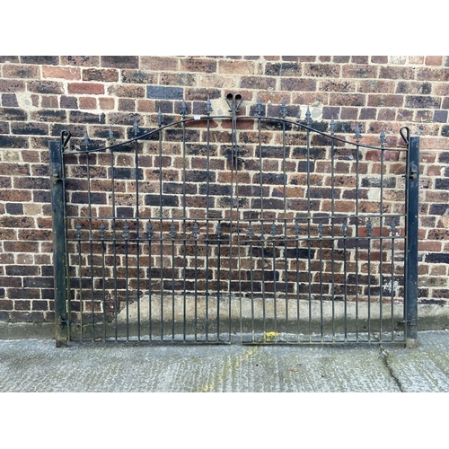 80 - A pair of black painted wrought iron garden gates - approx. 169cm high x 120cm wide