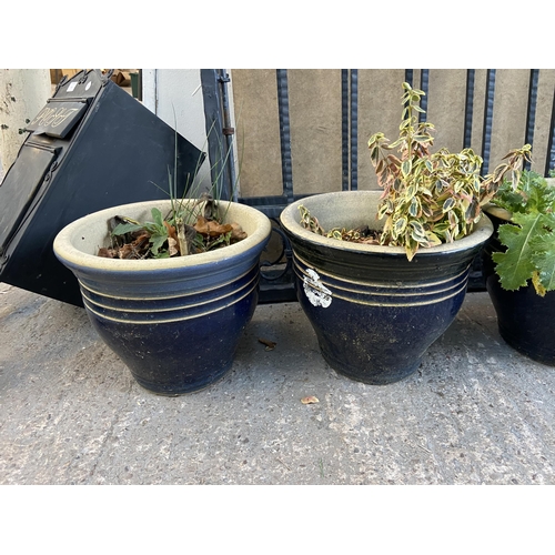 82 - Six garden planters, one Chinese hand painted porcelain and five blue glazed