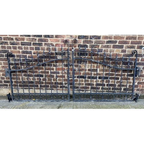 84 - A pair of black painted wrought iron garden gates - approx. 140cm high x 135cm wide