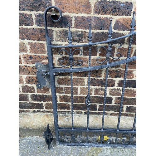 84 - A pair of black painted wrought iron garden gates - approx. 140cm high x 135cm wide