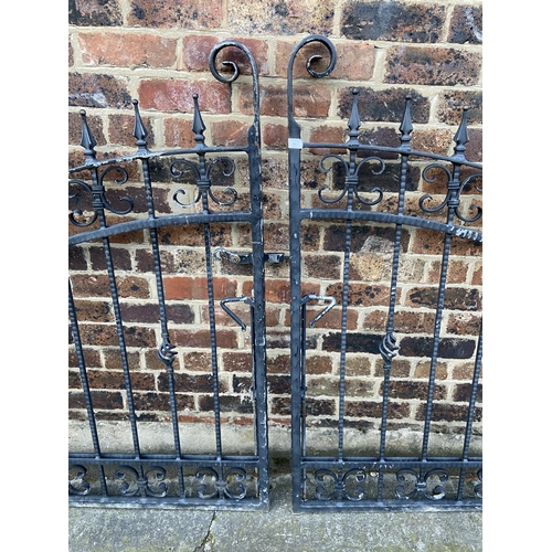 84 - A pair of black painted wrought iron garden gates - approx. 140cm high x 135cm wide