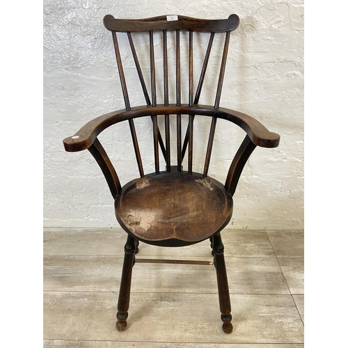 86 - An early 20th century Goldsmith style Windsor oak penny seat armchair - approx. 99cm high x 59cm wid... 