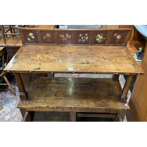 89 - A 19th century oak buffet with hand painted floral design back - approx. 126cm high x 110cm wide x 4... 